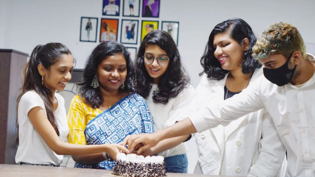 Farewell Is Not Always A Goodbye: The graduating students cutting the cake that was bought in by faculty and staff as a gesture for the new beginning